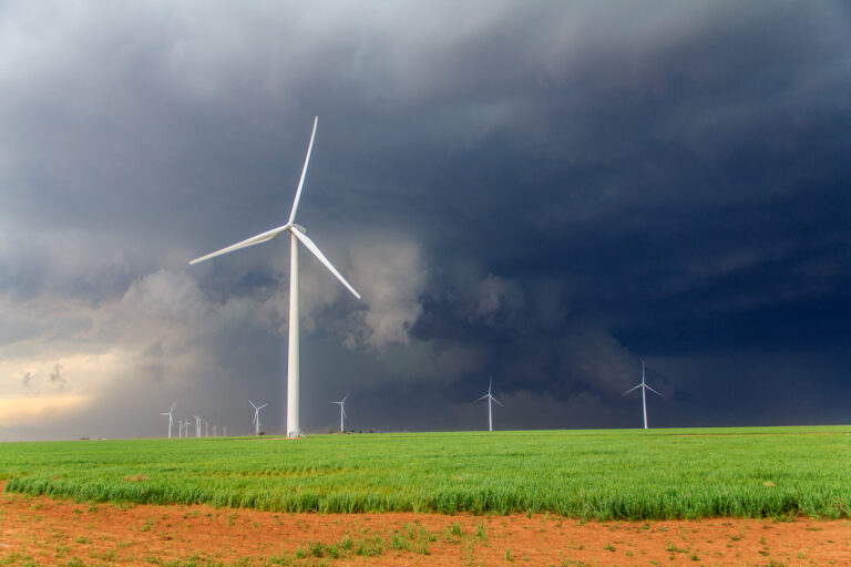 Wall Cloud behind windmills